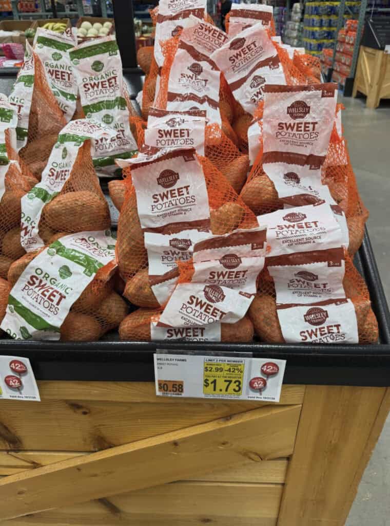 Fresh sweet potatoes in orange and white bags at BJ's Wholesale.